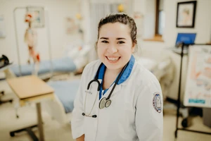 Girl in white nursing coat